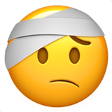 Emoji Wajah dengan Perban Dikepala Apple