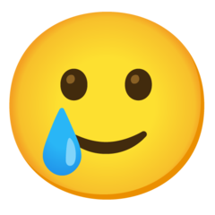 Emoji Wajah Tersenyum dengan Air Mata Google